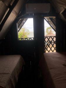 Letto o letti in una camera di Kite Point Atins