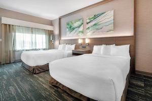 Postel nebo postele na pokoji v ubytování Best Western Plus Grand Rapids MN