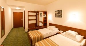 Postel nebo postele na pokoji v ubytování Best Western Airport Hotel Stella