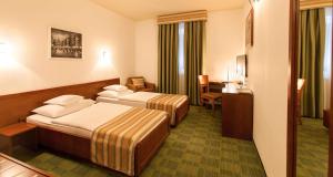 Postel nebo postele na pokoji v ubytování Best Western Airport Hotel Stella