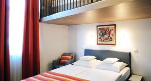 Postel nebo postele na pokoji v ubytování Best Western Airport Hotel Stella