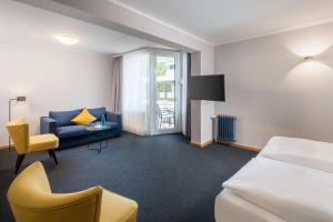 Postel nebo postele na pokoji v ubytování Best Western Hotel Kaiserslautern