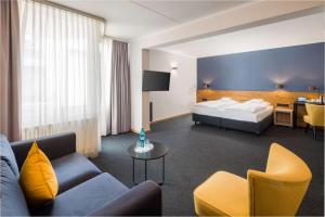 Postel nebo postele na pokoji v ubytování Best Western Hotel Kaiserslautern