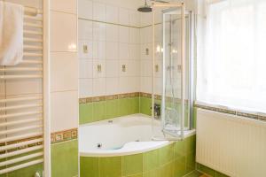 Kúpeľňa v ubytovaní Villa Emausy