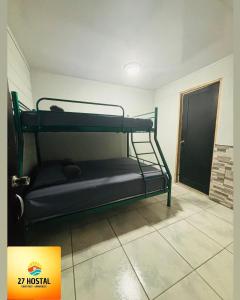 Postel nebo postele na pokoji v ubytování 27 Hostal + 8 fotografií