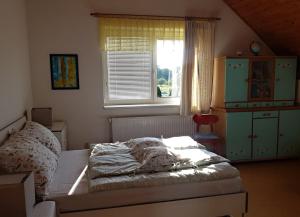 Postel nebo postele na pokoji v ubytování Apartmán Sluníčko