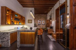 Posezení v ubytování Nueve 25 Hotel Boutique
