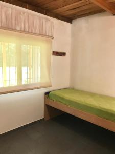 Ένα ή περισσότερα κρεβάτια σε δωμάτιο στο Quinta San Jose Los Cardales