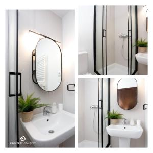 un baño con espejo y lavabo en Fancy 2BR Pipera Apartment, en Voluntari