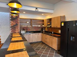 Kuchyň nebo kuchyňský kout v ubytování Santa Donama Paradise