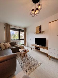 Posezení v ubytování Apartament Alma