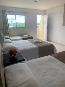 Katil atau katil-katil dalam bilik di Hotel La Ville