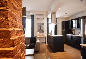 Kuchyň nebo kuchyňský kout v ubytování Maison Évangéline by Bower Boutique Hotels