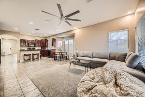 a living room with a couch and a table at Whitton House - Hot Tub - Fire Pit - Pets OK in Avondale +15 photos