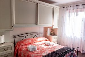 Postel nebo postele na pokoji v ubytování A casa di Marco Guesthouse - Apt di Ciampino e stazione per Roma