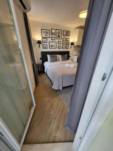 Postel nebo postele na pokoji v ubytování Blue Star Apartments