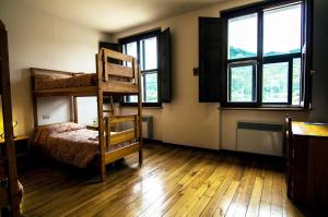Postel nebo postele na pokoji v ubytování Lo Chalet di Rovere