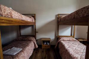 Postel nebo postele na pokoji v ubytování Lo Chalet di Rovere