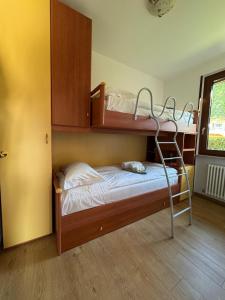 Postel nebo postele na pokoji v ubytování Sandy Apartment