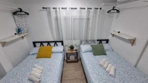 A bed or beds in a room at Mini Estudio Lovely Chueca