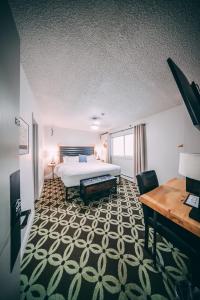 Postel nebo postele na pokoji v ubytování Highliner Hotel