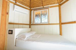Postel nebo postele na pokoji v ubytování Bugambilias Alojamiento
