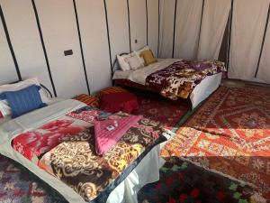 Voodi või voodid majutusasutuse Bivouac Luna toas