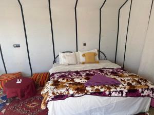 Voodi või voodid majutusasutuse Bivouac Luna toas