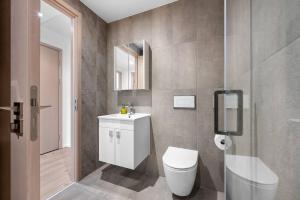 Koupelna v ubytování Luxe 1br Wlift & Free Gym Access In Station House