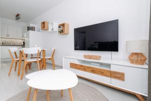 TV a/nebo společenská místnost v ubytování Apartmán 12 - Rezidence K Lanovce