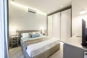 Postel nebo postele na pokoji v ubytování NEW Splash Lusso Con Piscine a 2 Passi Dal Mare