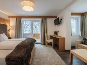 Postel nebo postele na pokoji v ubytování Hotel Victoria - adults only