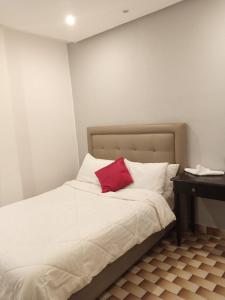 Katil atau katil-katil dalam bilik di Hotel Astoria Tanger