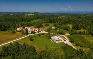 an aerial view of a house with a road at Villa Zel in Lovrinići