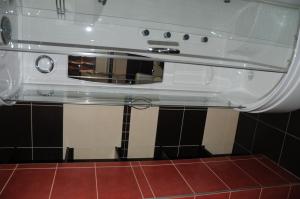 a white stove top oven in a bathroom at Penzion Luxury in Rožňava