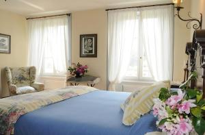 Postel nebo postele na pokoji v ubytování Villa Corti Lakeview