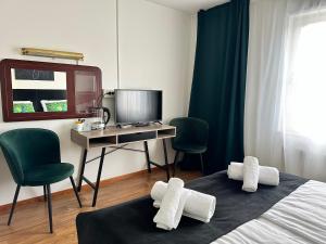 Televiisor ja/või meelelahutuskeskus majutusasutuses Hotell City Karlshamn