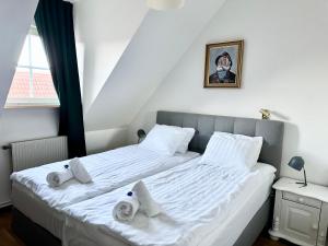 Voodi või voodid majutusasutuse Hotell City Karlshamn toas