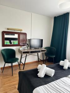 Televiisor ja/või meelelahutuskeskus majutusasutuses Hotell City Karlshamn