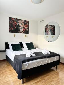 Postel nebo postele na pokoji v ubytování Hotell City Karlshamn