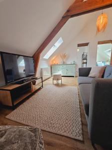 Televisyen dan/atau pusat hiburan di Appartement Vanille