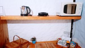 Set per la preparazione di tè e caffè presso Vale do Piemonte - Chalé com hidromassagem -