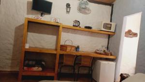 Cucina o angolo cottura di Vale do Piemonte - Chalé com hidromassagem -