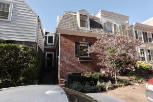 a house with a car parked in front of it at Idyllic Georgetown in Washington