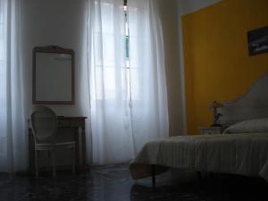 Posteľ alebo postele v izbe v ubytovaní Scala Apartment