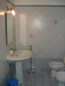 Kúpeľňa v ubytovaní Scala Apartment
