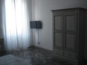 Televízia a/alebo spoločenská miestnosť v ubytovaní Scala Apartment
