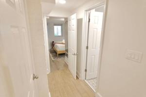 Postel nebo postele na pokoji v ubytování Kilbourne Cottage in Mount Pleasant