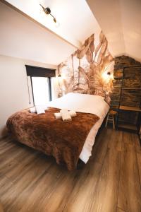 Voodi või voodid majutusasutuse Cosy Wood toas +34 fotot