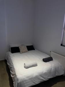 Postel nebo postele na pokoji v ubytování Dragon Nest SPA Concept
